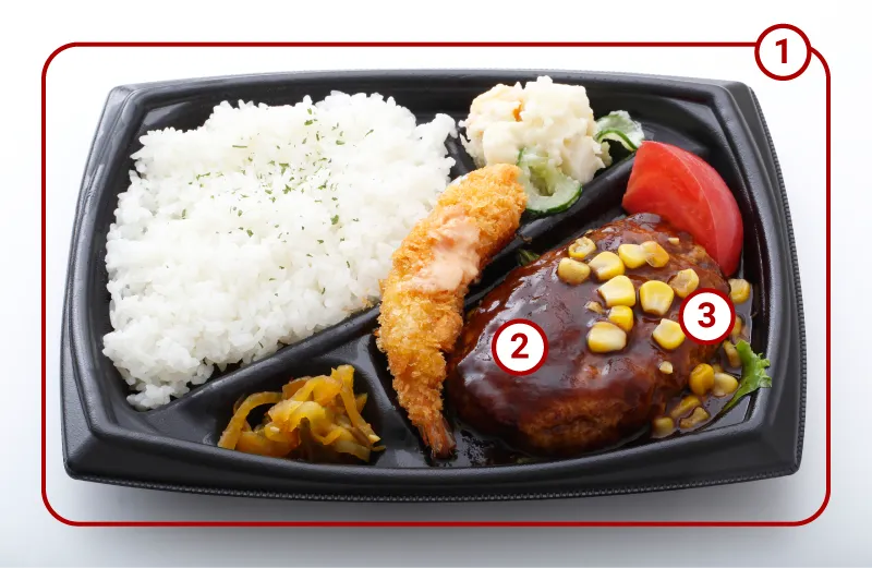 エビフライとハンバーグを添えたコンビニ弁当